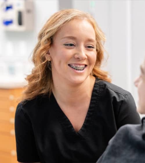 doctor Servello smiling with patient
